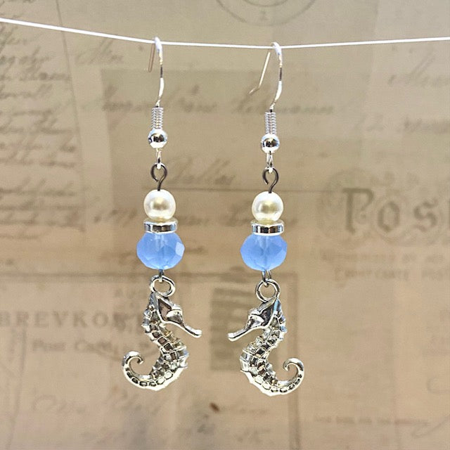 Seahorse dangle earrings with glass beads