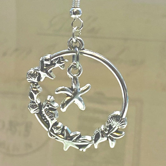 Silver seashell wreath dangle earrings