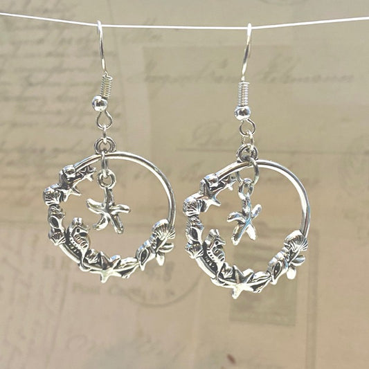 Silver seashell wreath dangle earrings